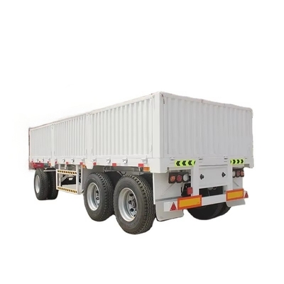 CIMC 40FT 2 Axles 7.5T tara น้ําหนัก 12.4 * 2.48m ภาระประโยชน์ 40T ยี่ห้อ JOST การทํางานมือสองความเร็ว รั้วรถเข็น Semi Trailer